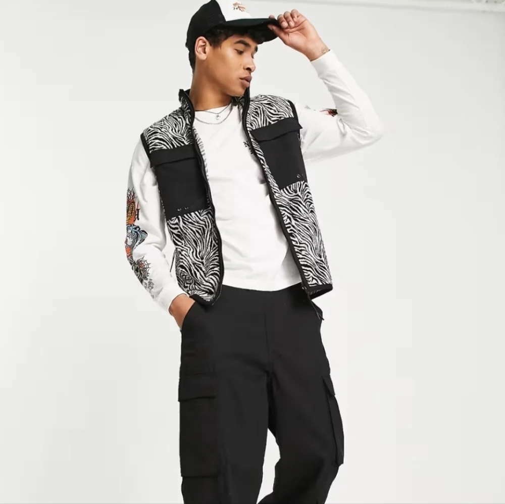 ASOS DESIGN festival vest jacket in all‎ over zebra print with pocket Size XL